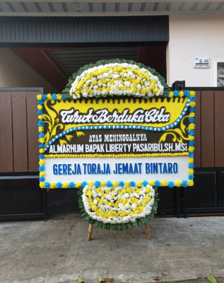 Papan Bunga Duka di Laubaleng